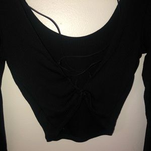 long sleeve shirt, back has a crisscross design